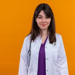 confident-young-female-doctor-medical-robe-with-stethoscope-looks-camera-isolated-orange-background-with-copy-space_141793-34390